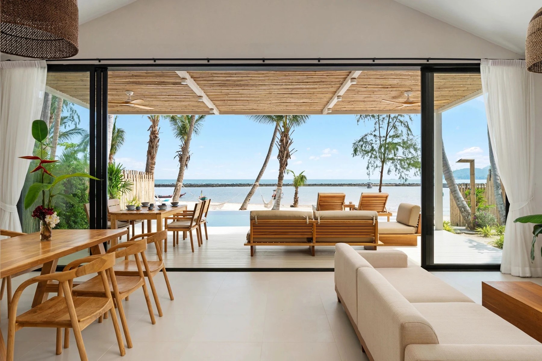 Open-air beachfront villa overlooking the ocean