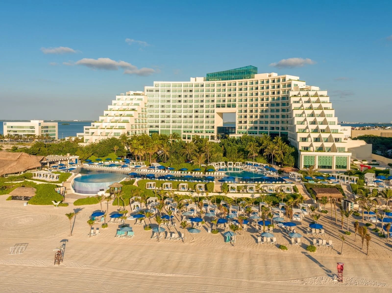 Beachfront resort beside a wide sandy beach