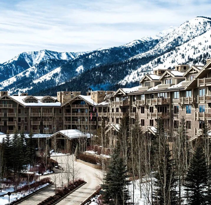Mountain resort surrounded by snow-covered peaks
