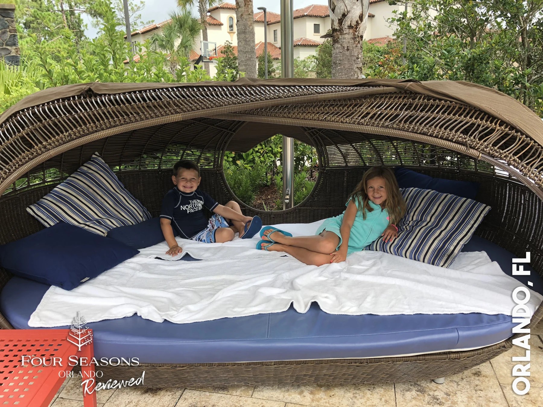 Blake’s family enjoying a shaded resort cabana